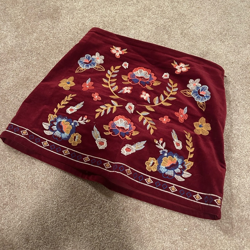 Priceless Maroon embroideredered mini skirt